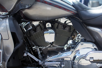 motor motorcycle closeup with reflection of the sun
