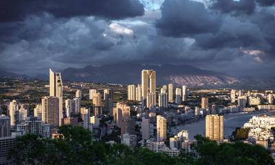 Benidorm skyscrapers at dusk with sun light