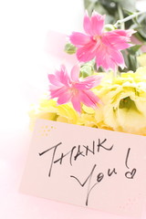 hand written Thank You card and flower bouquet