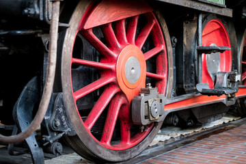old steam locomotive wheel closeup - old transport technology