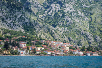 Fototapeta na wymiar Buildings of Dobrota coastal town in Kotor Bay, Montenegro