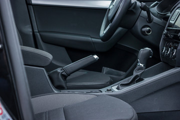 car interior with handbrake and gearstick