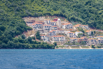 Fototapeta na wymiar View from Kotor Bay on Kostanjica, small coastal village in Montenegro