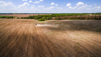 tractor preparing land for sowing sixteen rows aerial