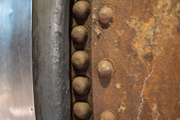 rusty metal closeup  - vintage   industrial texture with rivets