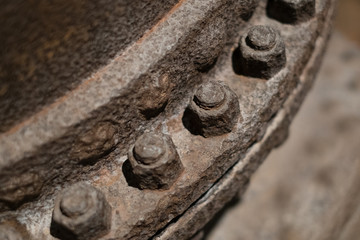 old screws and bolts closeup - rusty and eroded -