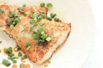 Chinese food, pan fried white fish and scallion