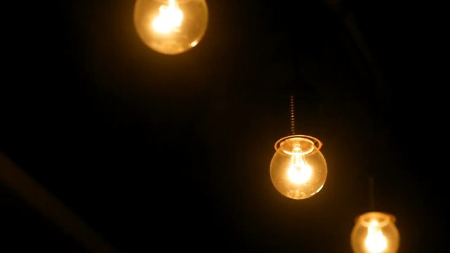 dark interior room with light bulbs