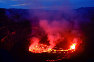 Lava and steam in crater of Nyiragongo volcano in Virunga National Park in Democratic Republic of Congo, Africa © Marian