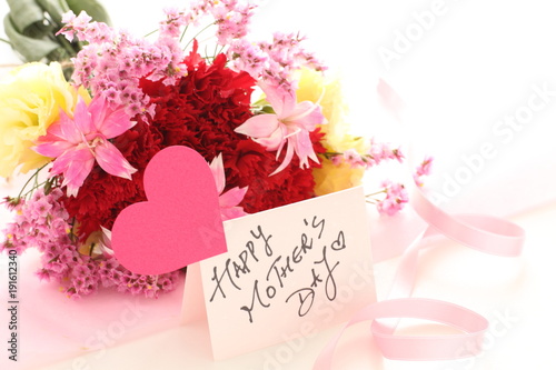 Carnation bouquet and hand written mother's day greeting card