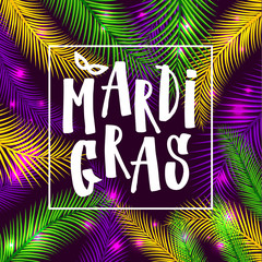Mardi gras invitation card on palm background © olga_milagros