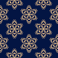 Golden flowers on blue background. Ornamental seamless pattern