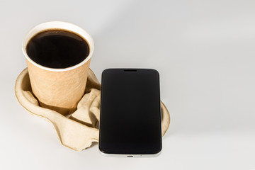 phone and coffee on the stand. businessman Breakfast. isolated