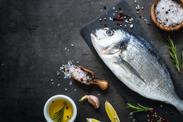 Dorado and ingredients for cooking