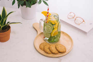 Detox water with vegetables and fruits. Diet healthy eating and weight loss.