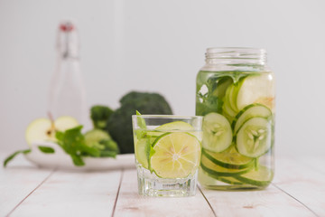 Detox water with vegetables and fruits. Diet healthy eating and weight loss.