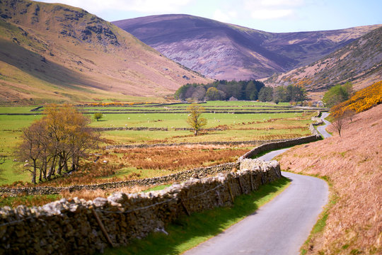 A quiet country lane near Mosedale, Caldbeck Fells in the English Lake District, UK.