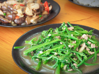 Sechium edule leaf fried with minced pork focus on Sechium edule