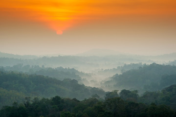 Fototapeta na wymiar Beautiful landscape of sunrise with layers mountain and mist at Namnao National Park Phetchabun Province, Thailand.