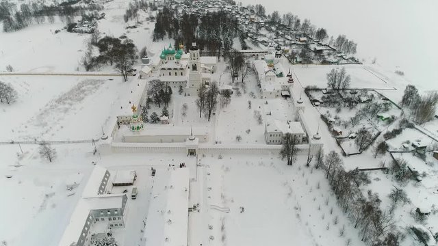 View from the heights to the Tolga convent in Yaroslavl on the banks of the Volga in winter. Russia