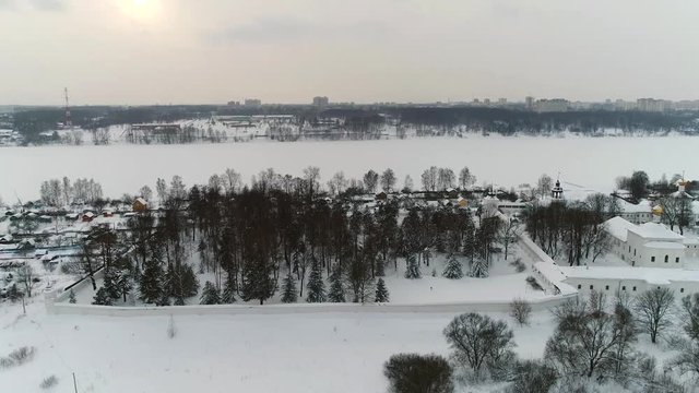 View from the heights to the Tolga convent in Yaroslavl on the banks of the Volga in winter. Russia