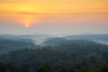 Beautiful landscape of sunrise with layers mountain and mist at Namnao National Park Phetchabun Province, Thailand.