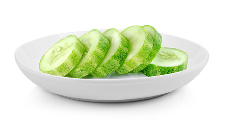 Fresh cucumber slice in plate on white background