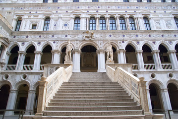 Fototapeta na wymiar Grandiose marble stairway in venetian Doge Palace, Italy