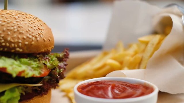 unhealthy junk food dinner. hamburger and french fries menu set. tomato sauce
