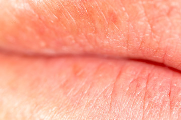 The lips of a man as a background