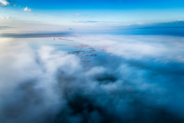 Aerial View. Flying over the clouds .