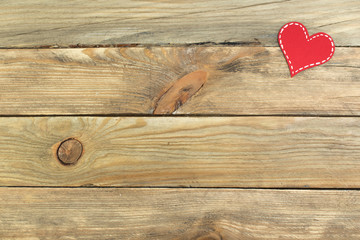 Red paper hearts on a wooden background. Valentine's Day. Copy space. Top view.