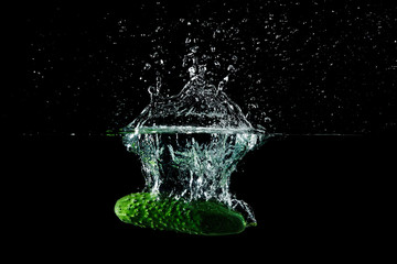 cucumber in water with splash