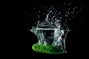 cucumber in water with splash