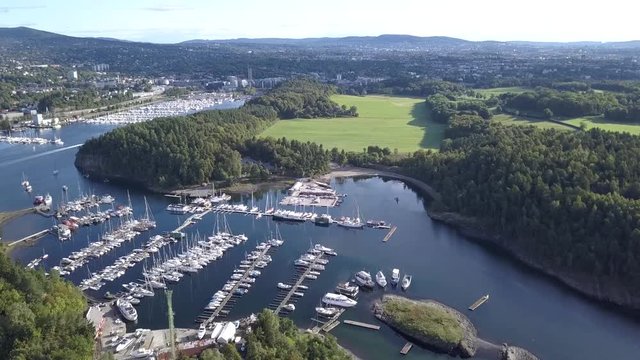 Aerial drone footage over Killingen Marina on Bygdoy, Oslo, Norway in summer