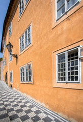 Fototapeta na wymiar Old orange house on the Mostecka street in Prague