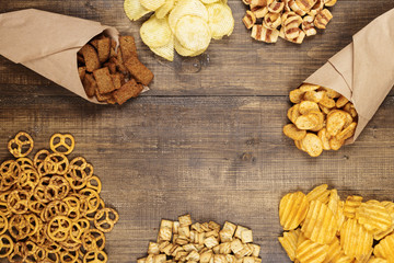 Beer snacks on a wooden surface