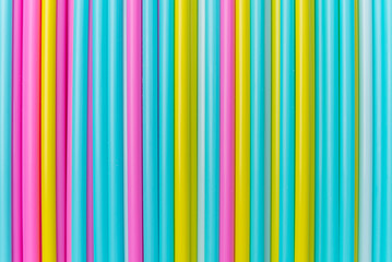 Obraz premium colorful cocktail tubes lie closeup. Top view image.