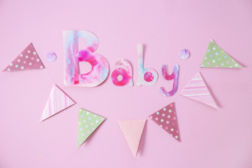 Beautiful decorations for baby shower party on color wall