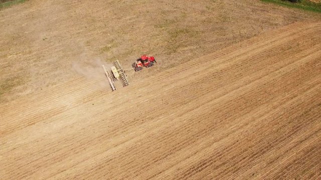tractor preparing land for sowing sixteen rows aerial