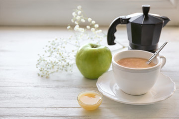 Composition with tasty breakfast on wooden table