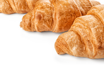 Tasty croissants on white background