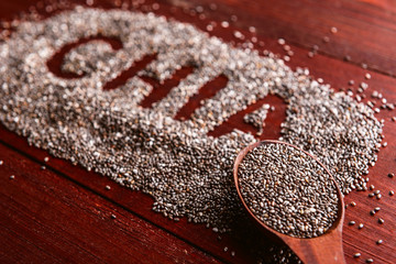 chia seeds on a wooden background. concept of healthy and healthy food.