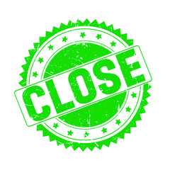 Close green grunge stamp isolated