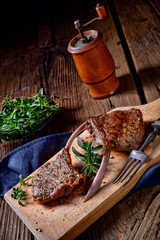 Grilled lamb chops an old board