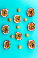 Passion fruit and longan on blue background, fresh summer