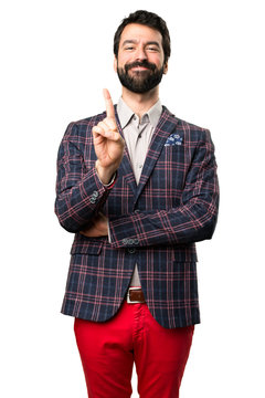 Well dressed man counting one on white background