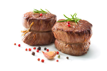Grilled beef fillet steaks mignon isolated on white background