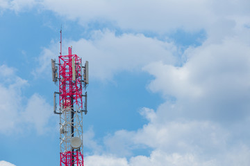 Communication Tower with antenna and satellite dish telecom network on blue sky background.