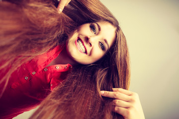 Fototapeta premium Happy positive woman with long brown hair